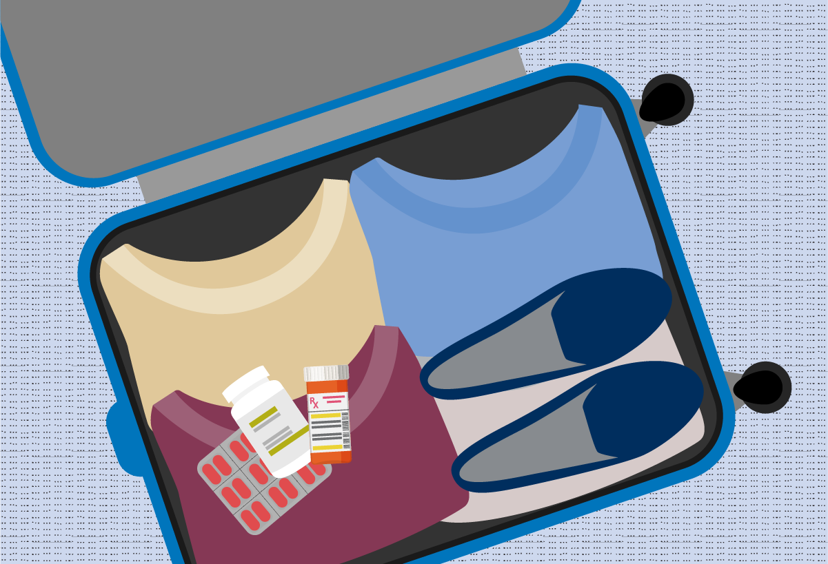 A packed suitcase with prescription medications
