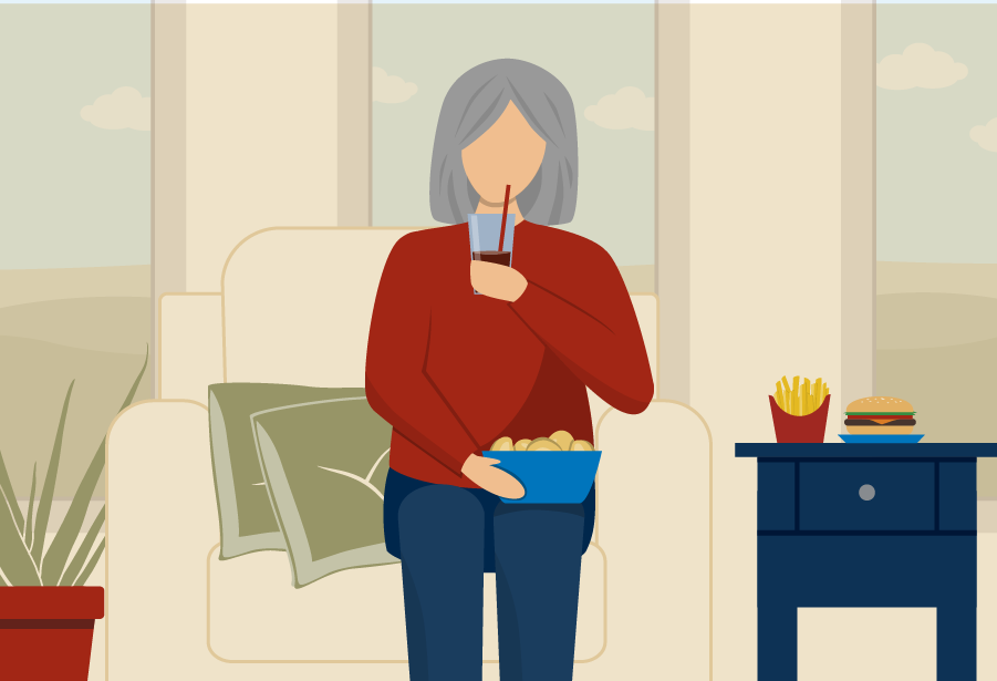 Addiction to Highly Processed Food older woman sitting on couch eating highly processed food