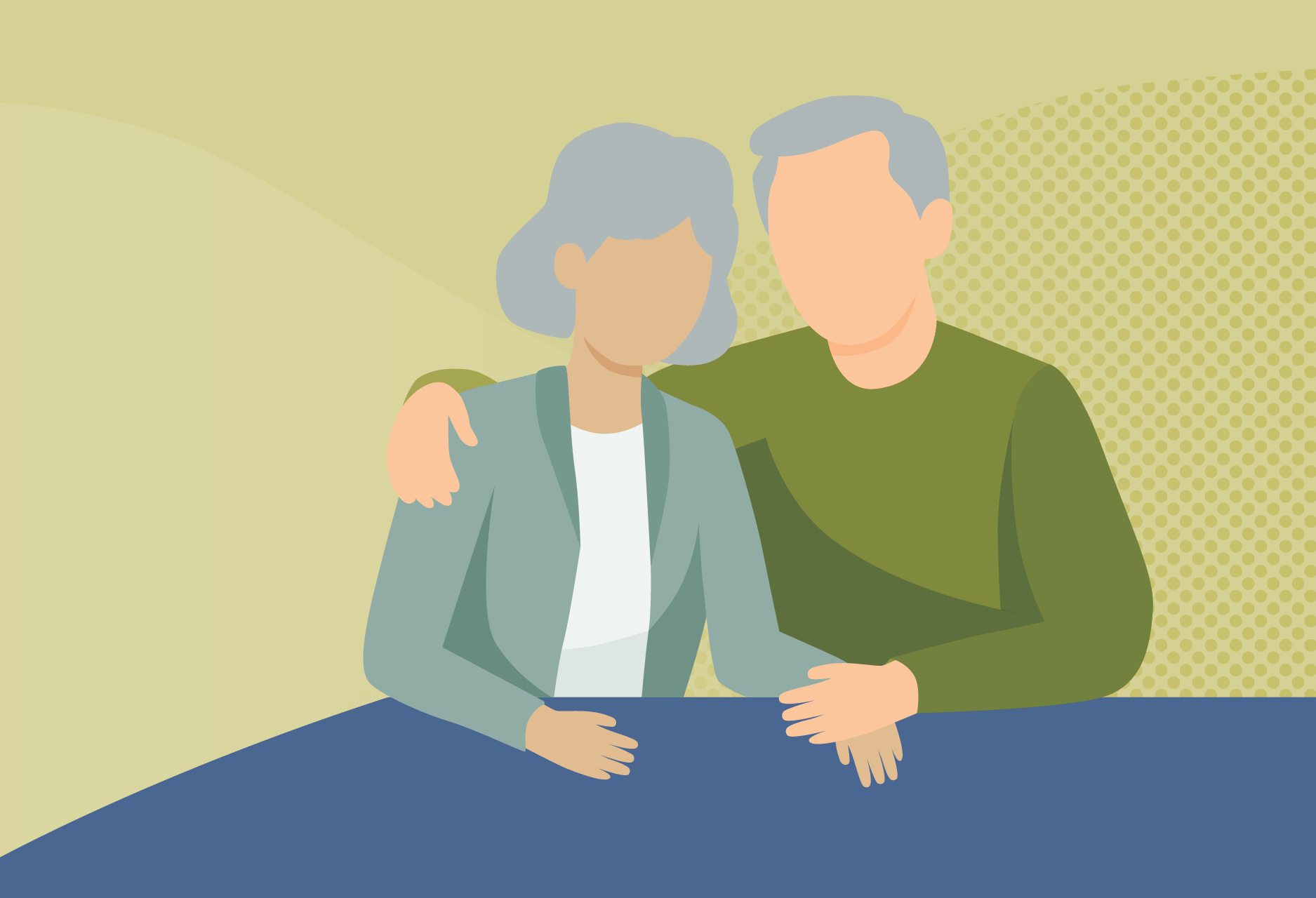An older couple holding hands at a table