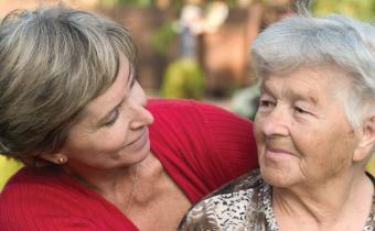 Caregiver and her mother sharing a moment