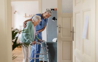 Older woman in home with caregiver