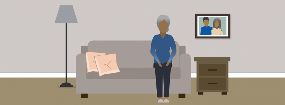 older woman sitting alone on couch