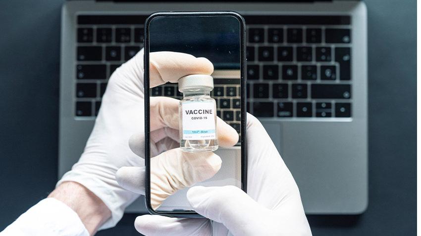 COVID-19 vaccine smartphone computer
