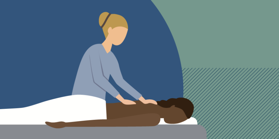 A massage therapist helping a patient
