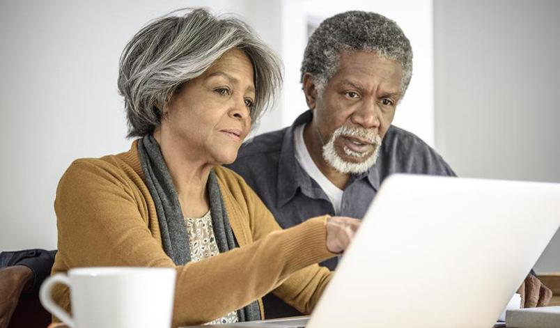 couple looking at computer